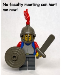 A Lego knight with shield, sword and helmet. It is pretty happy that no faculty meeting can hurt it now.